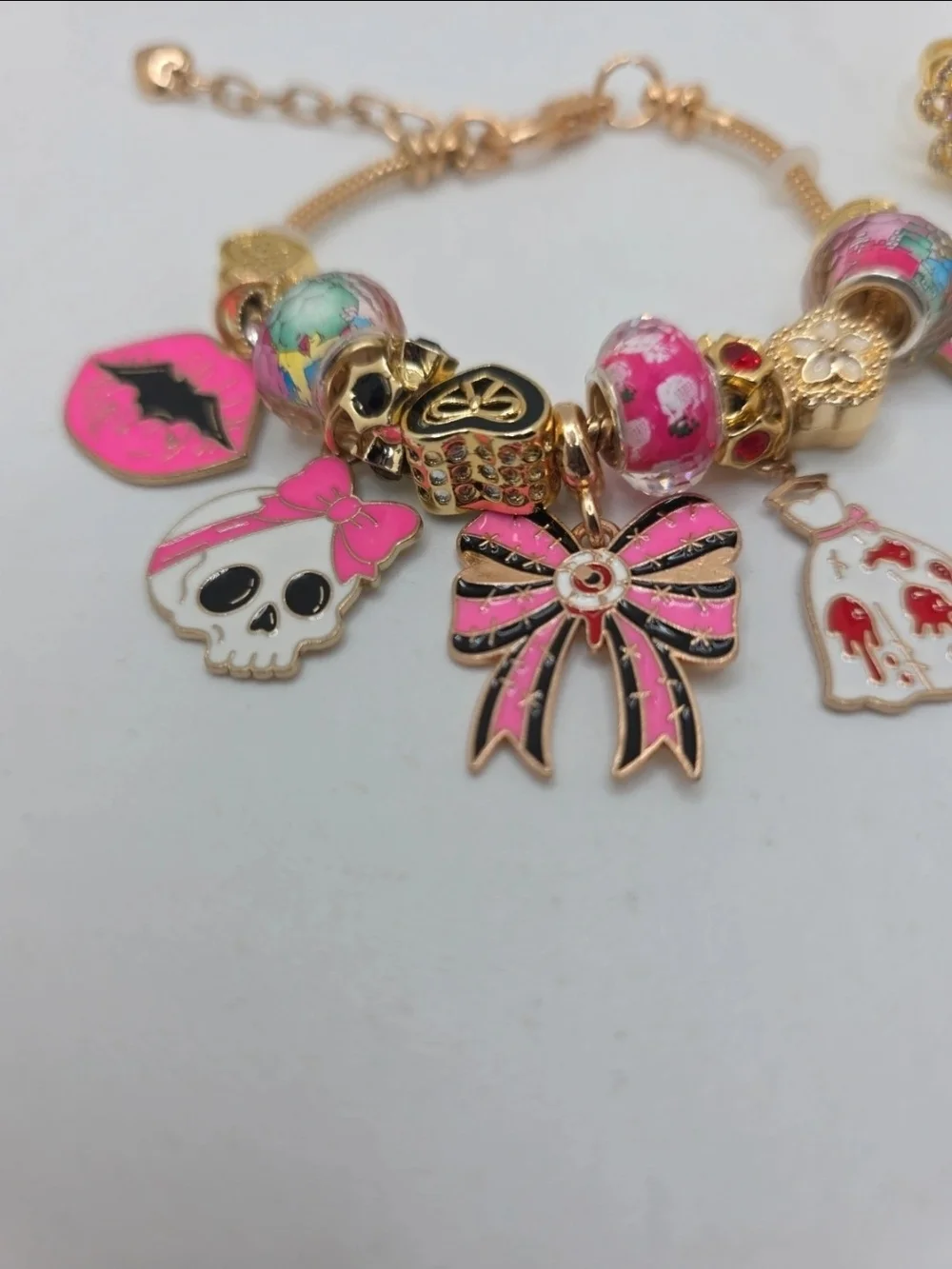 Monster High Pink & Gold Charm Bracelet with Dress, Bow, Skull & Mirror Charms